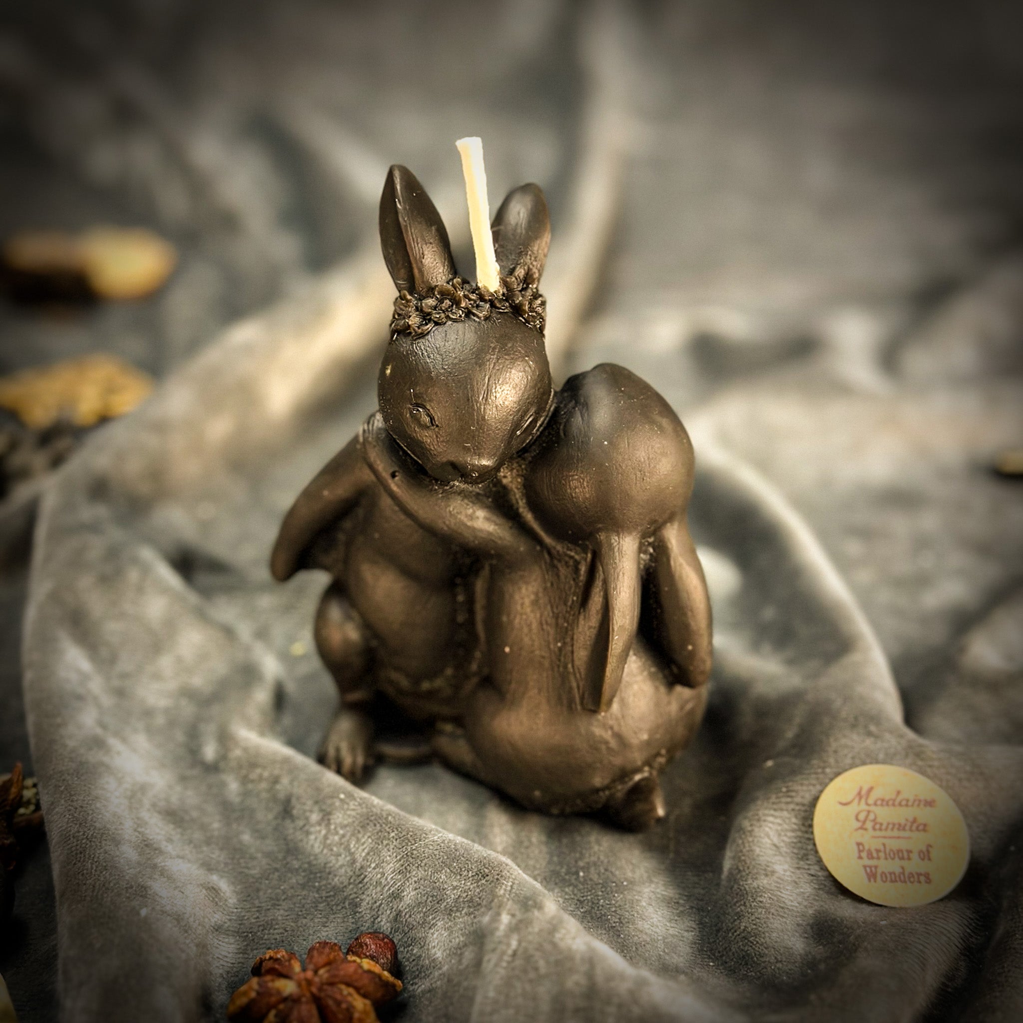 Purple Rabbit Candle Spell Kit by Parlour of Wonders for good luck and new beginnings, featuring candles and magical tools.