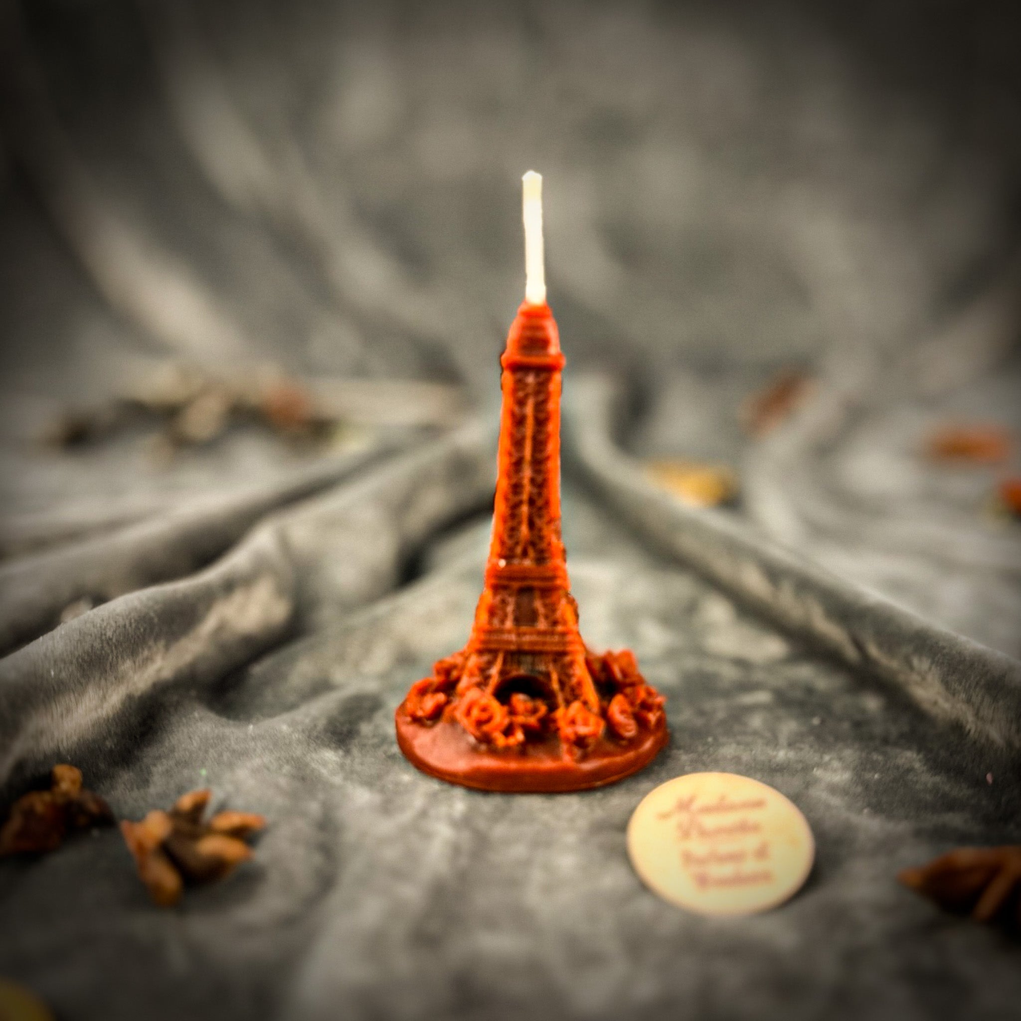 Purple Eiffel Tower travel candle spell kit by Parlour of Wonders, featuring a luxury candle for adventure and wanderlust magic.