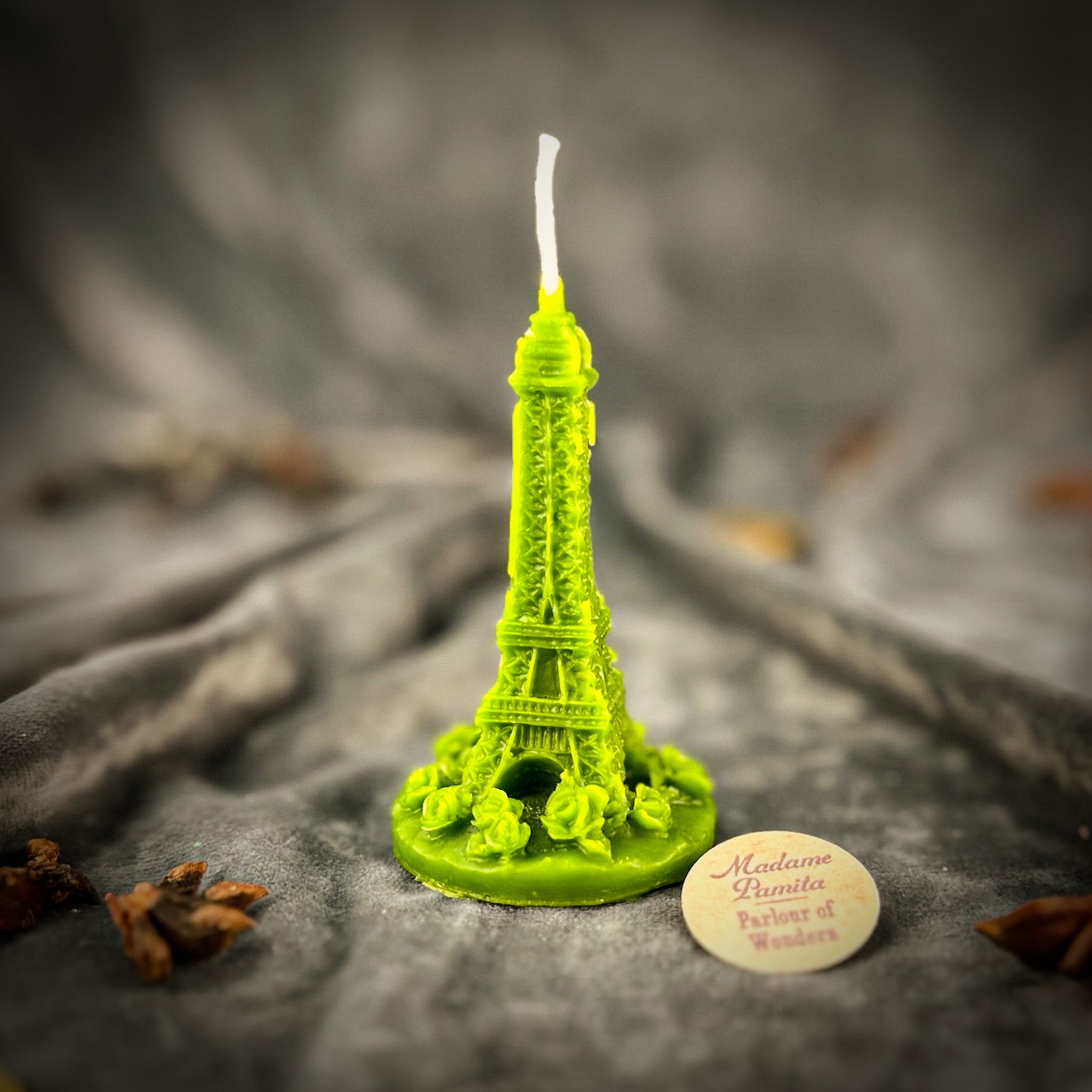 Purple Eiffel Tower Candle Spell Kit by Parlour of Wonders, featuring travel-themed candles for adventure and wanderlust magic.