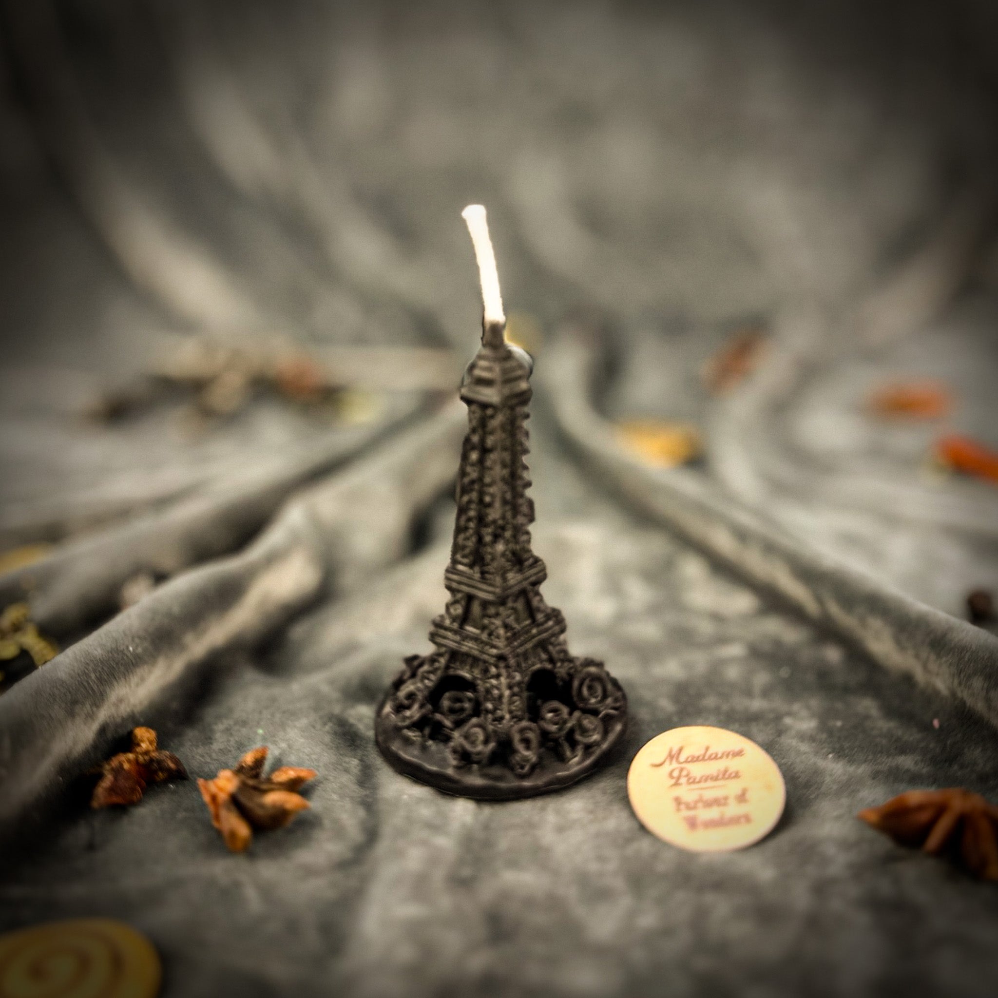 Purple Eiffel Tower Candle Spell Kit by Parlour of Wonders, featuring travel-themed candles for adventure and wanderlust magic.