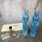 Parlour of Wonders Come to Me Candle Spell Kit with purple candles and human female figure for attracting love and passion.