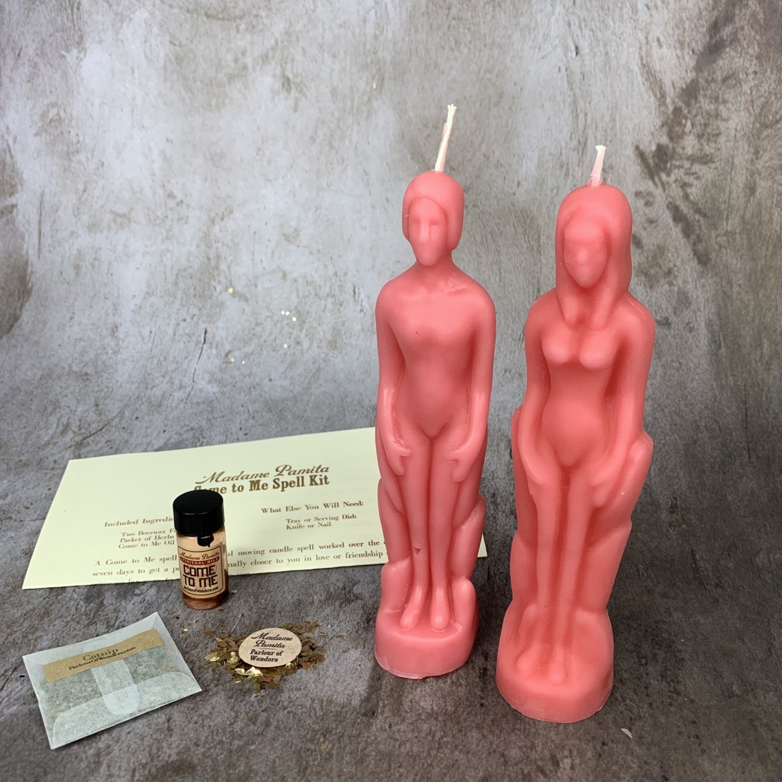 Parlour of Wonders Come to Me Candle Spell Kit with purple candle and human female figure, designed to attract love and passion.