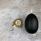 Purple Egg Talisman Candle Spell Kit by Parlour of Wonders for new beginnings and fertility magic, includes candles and ritual tools.