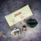 Parlour of Wonders Gift of Gab Candle Spell Kit with purple candles for eloquent speech and powerful communication.