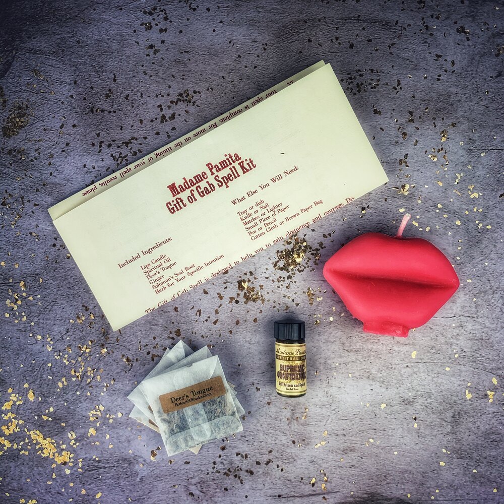 Parlour of Wonders Gift of Gab Candle Spell Kit with purple candles for eloquent speech and powerful communication.