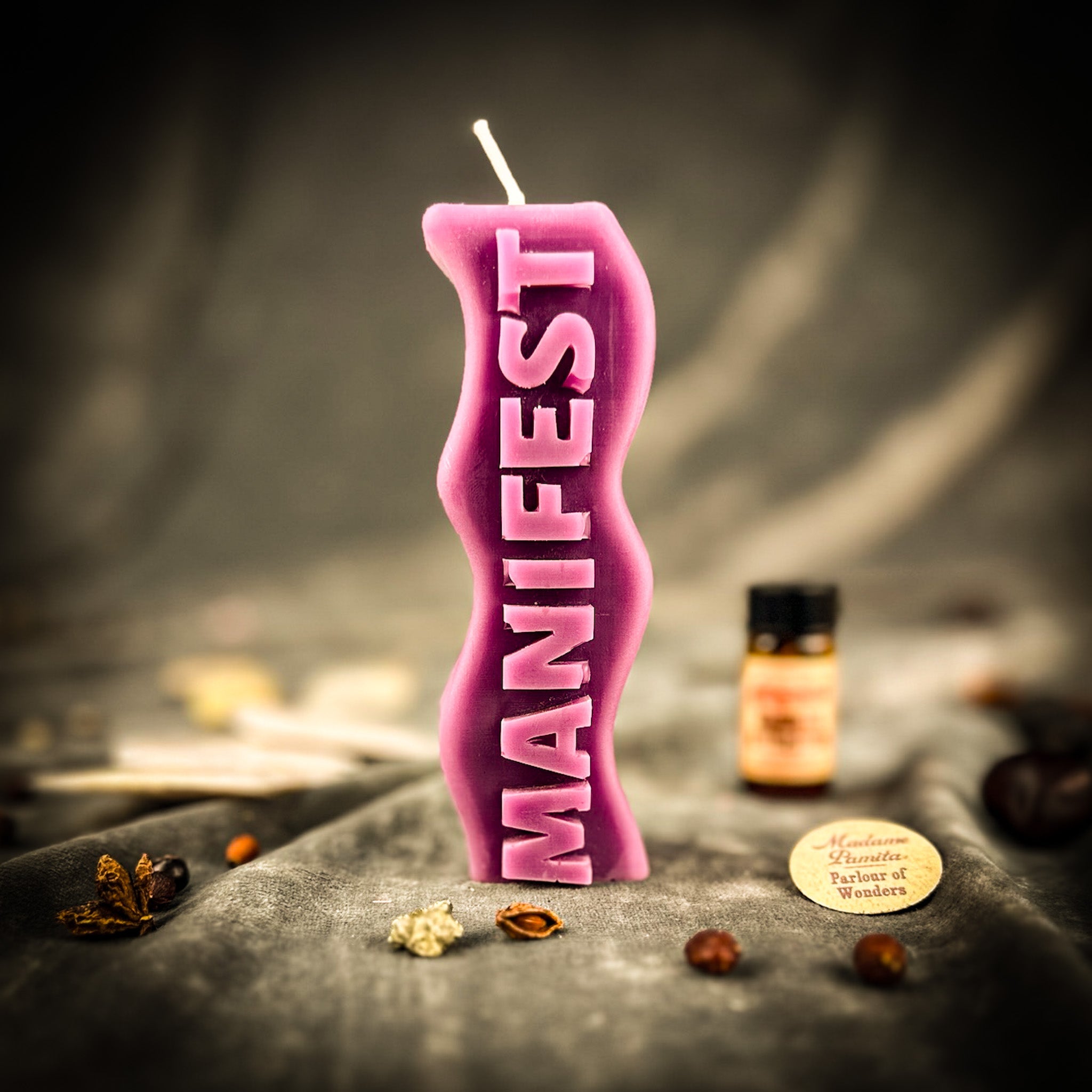 Purple Candle Spell Kit by Parlour of Wonders for manifesting goals and abundance, includes candles and magic tools.
