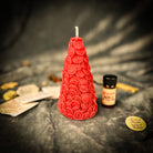 Red Cone of Coins Candle Spell Kit by Parlour of Wonders for money attraction and prosperity magic, with candles and spell components.