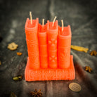 Red Candle Spell Kit with magical book images, designed for learning, writing, and boosting creativity by Parlour of Wonders.