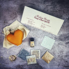 Red Candle Spell Kit for love reconciliation and emotional healing by Parlour of Wonders, includes candles and spell components.