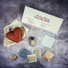 Red Passion Change of Heart Candle Spell Kit from Parlour of Wonders for love reconciliation and emotional healing.