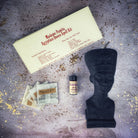 Egyptian Queen Candle Spell Kit by Parlour of Wonders with red candles and magical symbols for power, beauty, and magnetism magic.