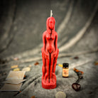 Red female figural candle from Parlour of Wonders Candle Spell Kit for sympathetic magic and personal power rituals.
