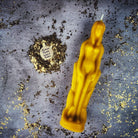 Red female figural candle from Parlour of Wonders Candle Spell Kit for sympathetic magic and personal power rituals.