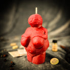 Parlour of Wonders Goddess of Willendorf Candle Spell Kit with red candles, symbols of feminine power and fertility magic.