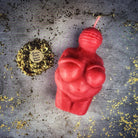 Parlour of Wonders Goddess of Willendorf Candle Spell Kit with red candles, symbols of feminine power and fertility magic.