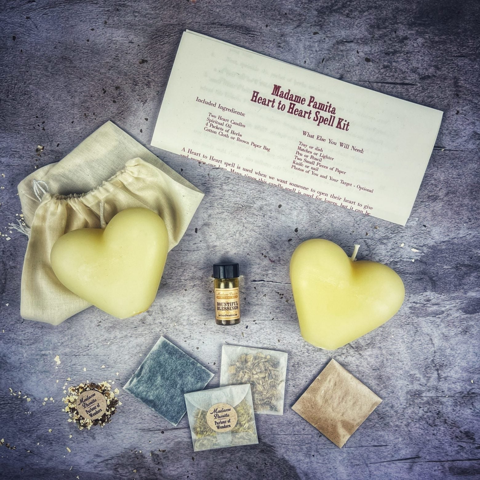 Red Heart to Heart Candle Spell Kit for love connection and reconciliation magic, featuring candles and ritual tools by Parlour of Wonders.
