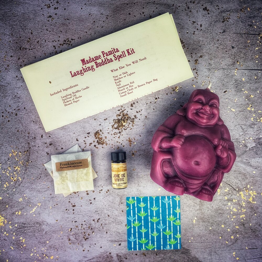 Red Passion Laughing Buddha Candle Spell Kit by Parlour of Wonders for abundance, wealth, luck, and prosperity magic.