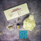 Red Laughing Buddha Candle Spell Kit by Parlour of Wonders for abundance, wealth, luck, and prosperity magic.