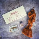 Red Lovers Passion Candle Spell Kit by Parlour of Wonders for igniting romance and desire, featuring candles and spiritual tools.