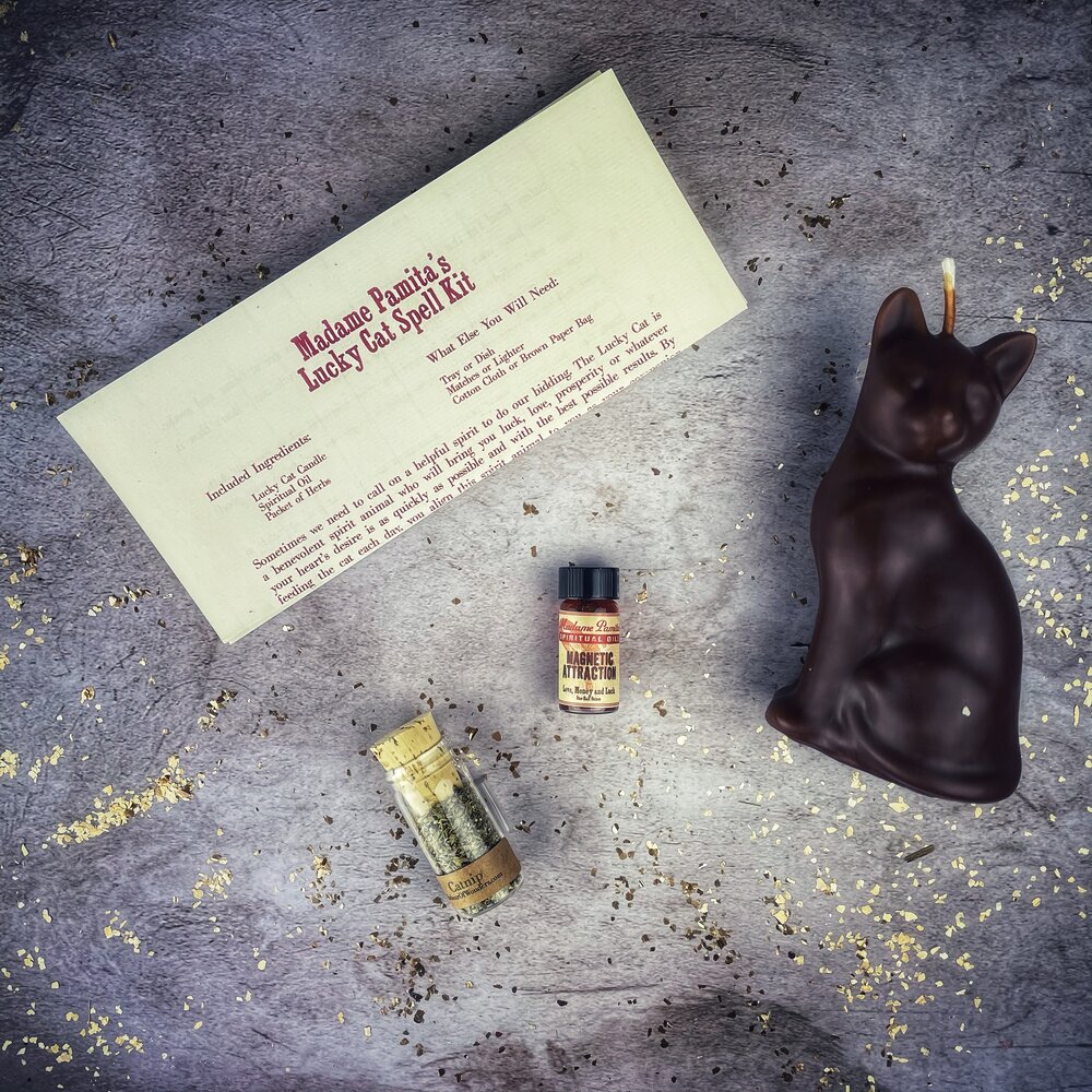 Red Lucky Cat Candle Spell Kit by Parlour of Wonders with candles and spell components for manifestation magic.