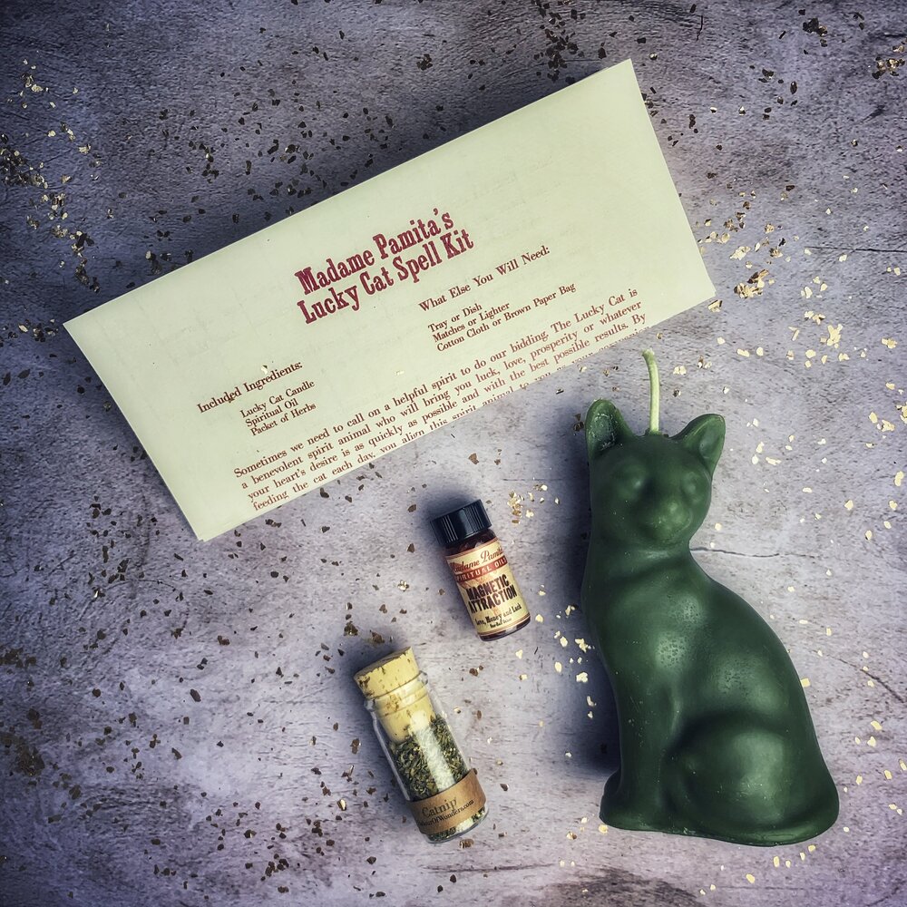 Red Lucky Cat Candle Spell Kit by Parlour of Wonders, featuring candles and tools for fast action and manifestation magic.