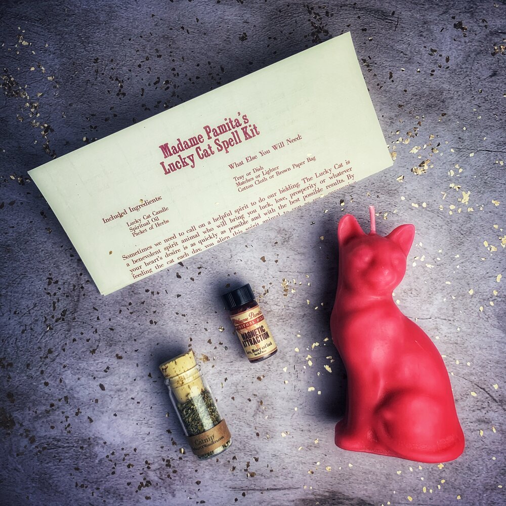 Red Lucky Cat Candle Spell Kit by Parlour of Wonders featuring candles and tools for fast action and manifestation magic.
