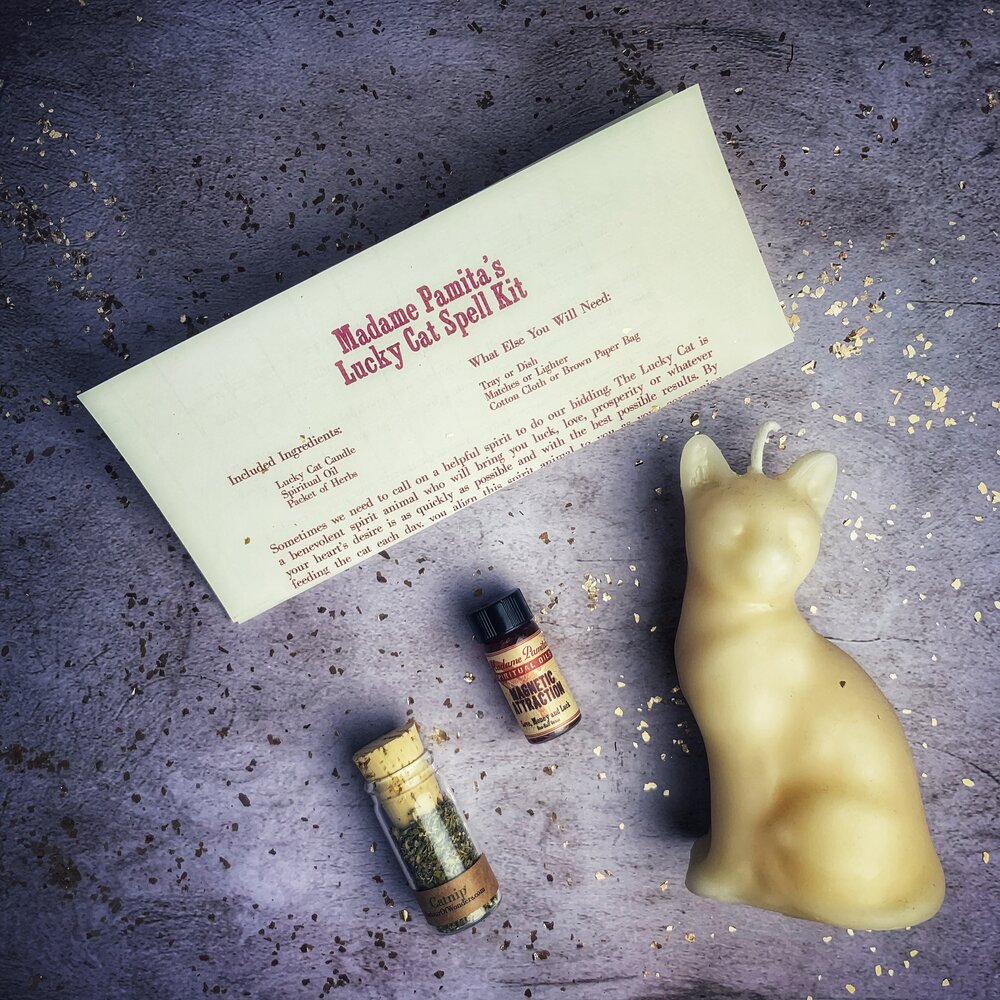 Parlour of Wonders Lucky Cat Candle Spell Kit with red candles for fast action and manifestation magic, featuring a lucky cat design.