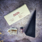 Red Pyramid of Power Candle Spell Kit by Parlour of Wonders with candles and spell components for success and stability.