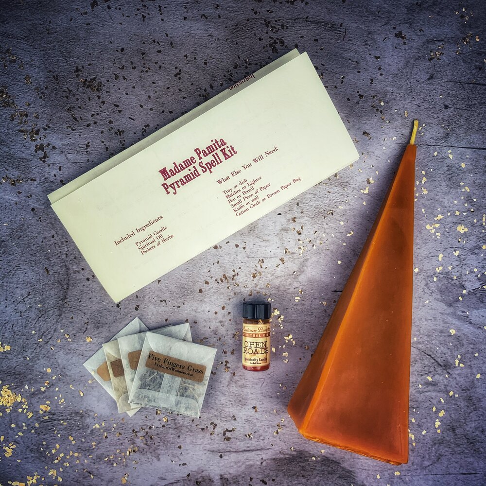 Red Pyramid of Power Candle Spell Kit by Parlour of Wonders with candles and spell components for success and stability.