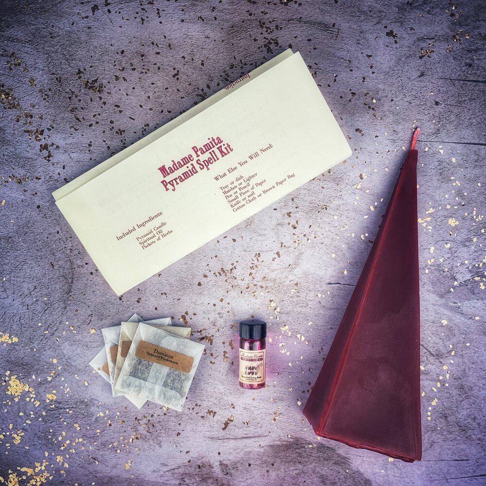 Red Pyramid of Power Candle Spell Kit by Parlour of Wonders with candles and ritual tools for success and stability.