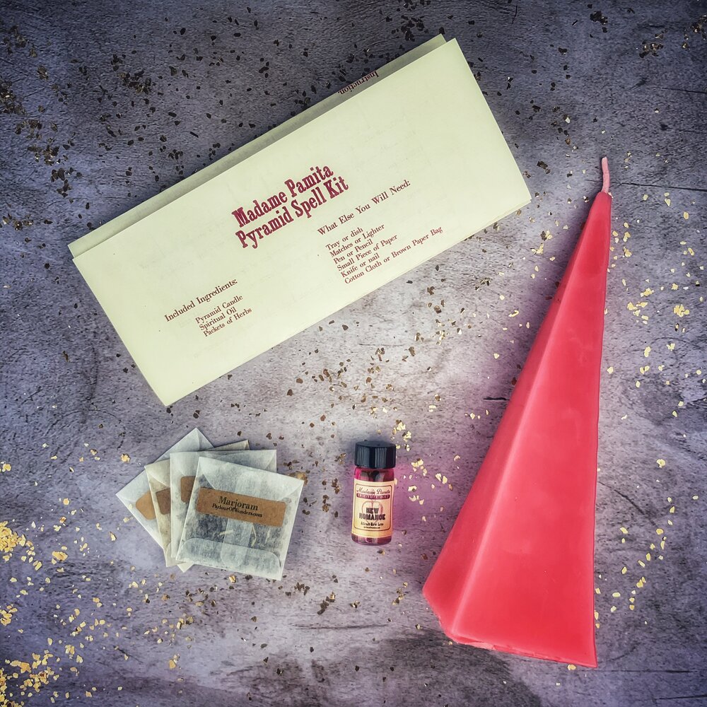 Red Pyramid of Power Candle Spell Kit by Parlour of Wonders, featuring candles and ritual supplies for success and stability.