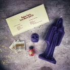 Red Santa Muerte Candle Spell Kit by Parlour of Wonders with sacred folk saint devotion and protection elements, includes candles and spell tools.