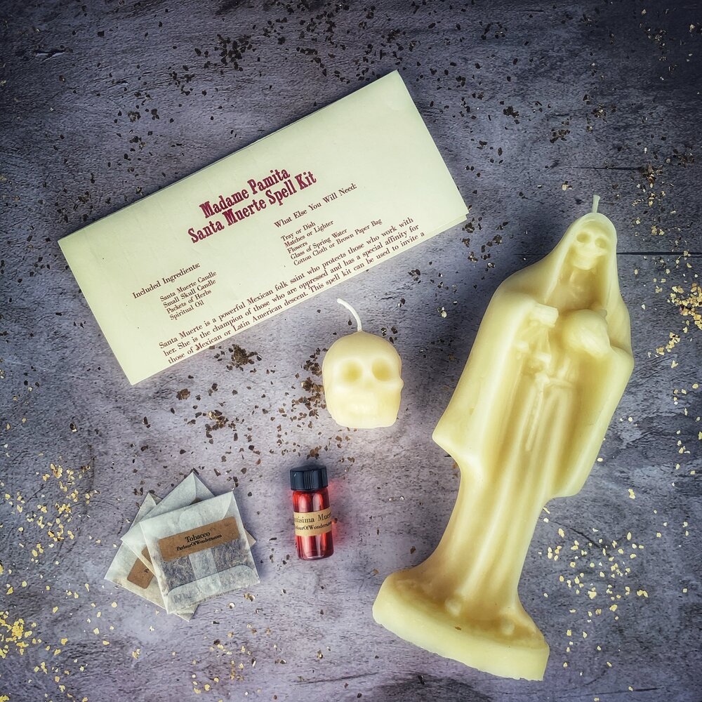 Red Santa Muerte Candle Spell Kit by Parlour of Wonders, featuring sacred folk saint devotion and protection symbols.