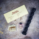 Red Passion Seven Knob Candle Spell Kit by Parlour of Wonders for seven-day manifestation magic, includes candles and ritual tools.