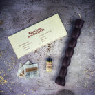 Red Passion Seven Knob Candle Spell Kit for seven-day manifestation magic by Parlour of Wonders, includes candles and ritual tools.