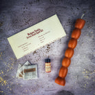 Red Passion Seven Knob Candle Spell Kit by Parlour of Wonders for seven-day manifestation magic, includes candles and ritual tools.