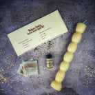 Red Passion Seven Knob Candle Spell Kit by Parlour of Wonders for seven-day manifestation magic, featuring seven candles for spell work.