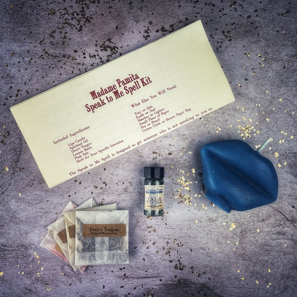 Red Candle Spell Kit by Parlour of Wonders for open communication and reconciliation, featuring candles and ritual tools.