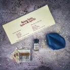 Red Candle Spell Kit by Parlour of Wonders for open communication and reconciliation, featuring candles and ritual tools.