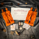 Deluxe Smooth Separation Candle Spell Kit by Parlour of Wonders featuring red candles for peaceful parting and love guidance.