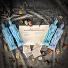 Deluxe Smooth Separation Candle Spell Kit by Parlour of Wonders with red candles for peaceful parting and love direction.