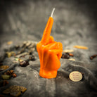 Red candle spell kit with middle finger design for banishing and empowerment magic, by Parlour of Wonders.