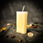 Red candle spell kit from Parlour of Wonders featuring mystical symbols for manifestation and willpower magic.