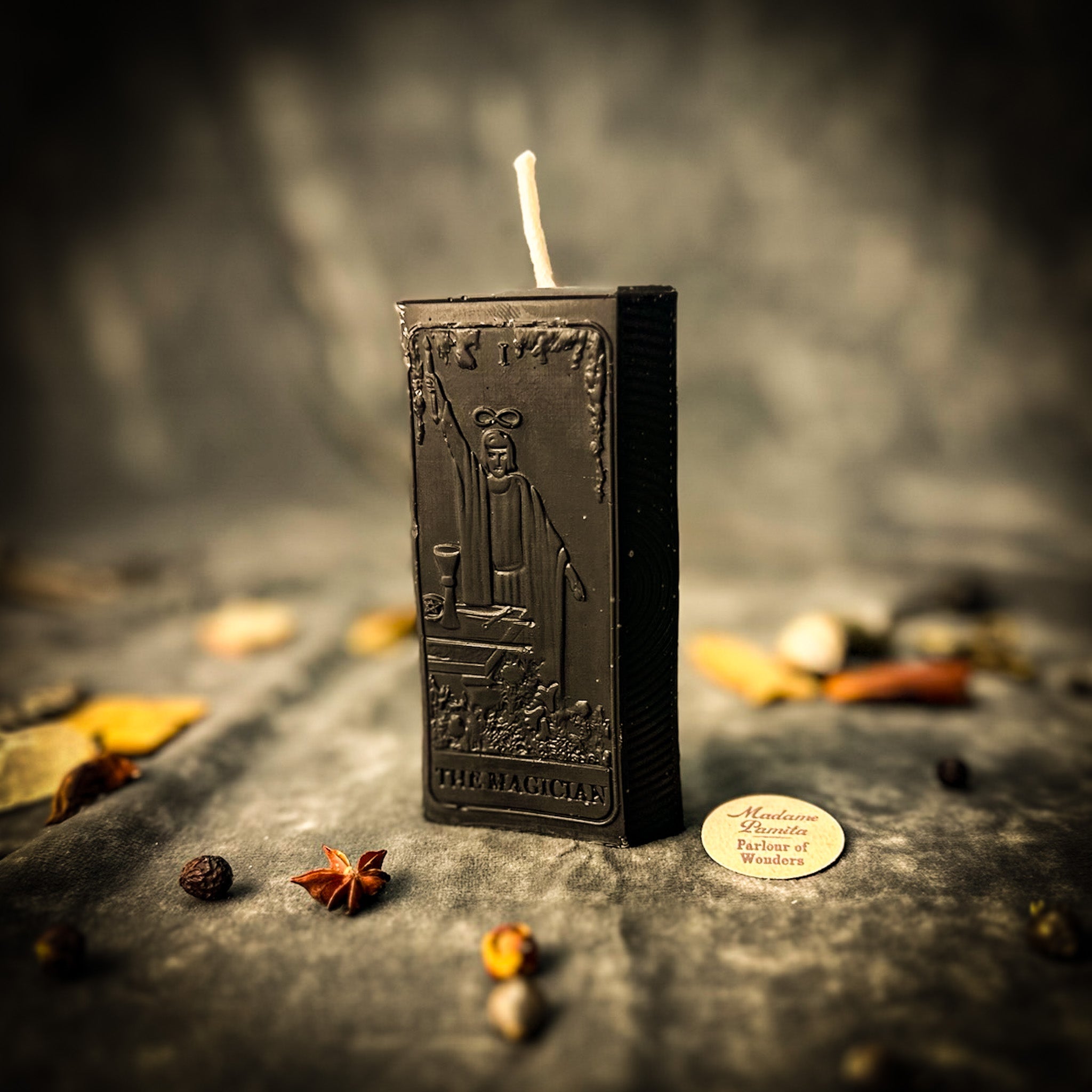 Red candle spell kit for manifestation and willpower magic from Parlour of Wonders, includes candles and ritual tools.