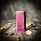 Red Candle Spell Kit from Parlour of Wonders featuring candles for manifestation and willpower magic in a mystical setup.