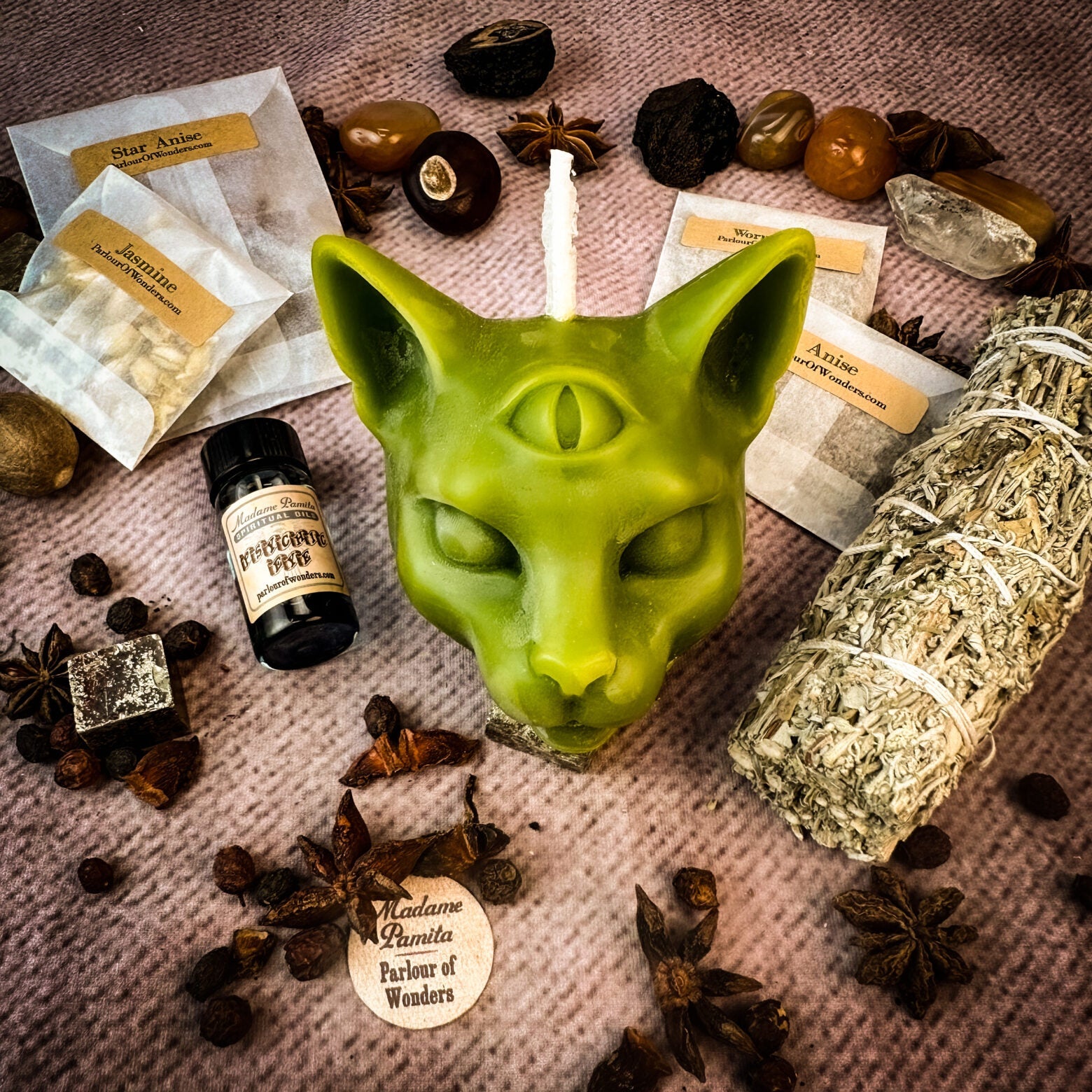 Parlour of Wonders Psychic Eye Candle Spell Kit with yellow candles for intuition and psychic abilities, displayed with spell ingredients.