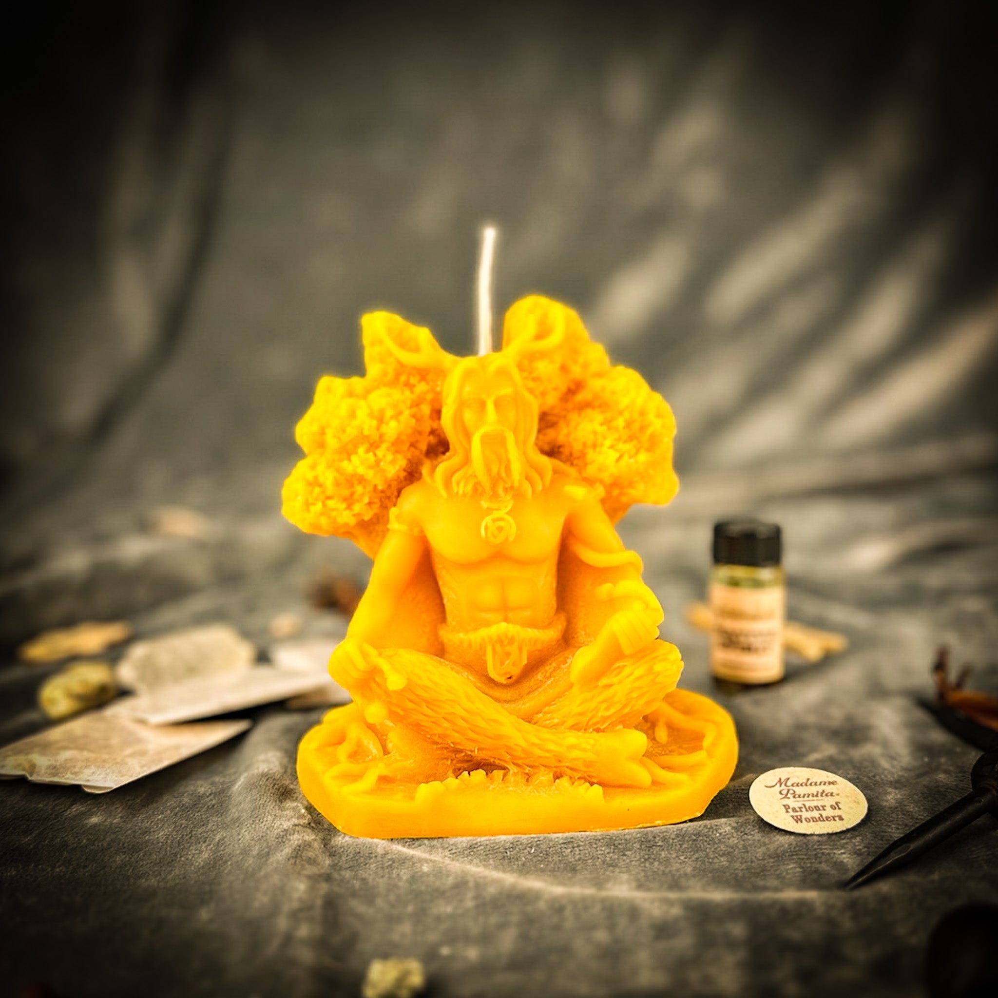 Horned God Candle Spell Kit by Parlour of Wonders featuring a yellow candle for Cernunnos nature magic and fertility rituals.