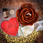 Parlour of Wonders Rose Romance Candle Spell Kit with yellow candles and love-themed elements for romance and happiness.