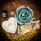 Parlour of Wonders Rose Romance Candle Spell Kit with yellow candles, roses, and spell ingredients for love and romance.