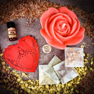 Parlour of Wonders Rose Romance Candle Spell Kit with yellow candles and love-themed accessories for romance and happiness.
